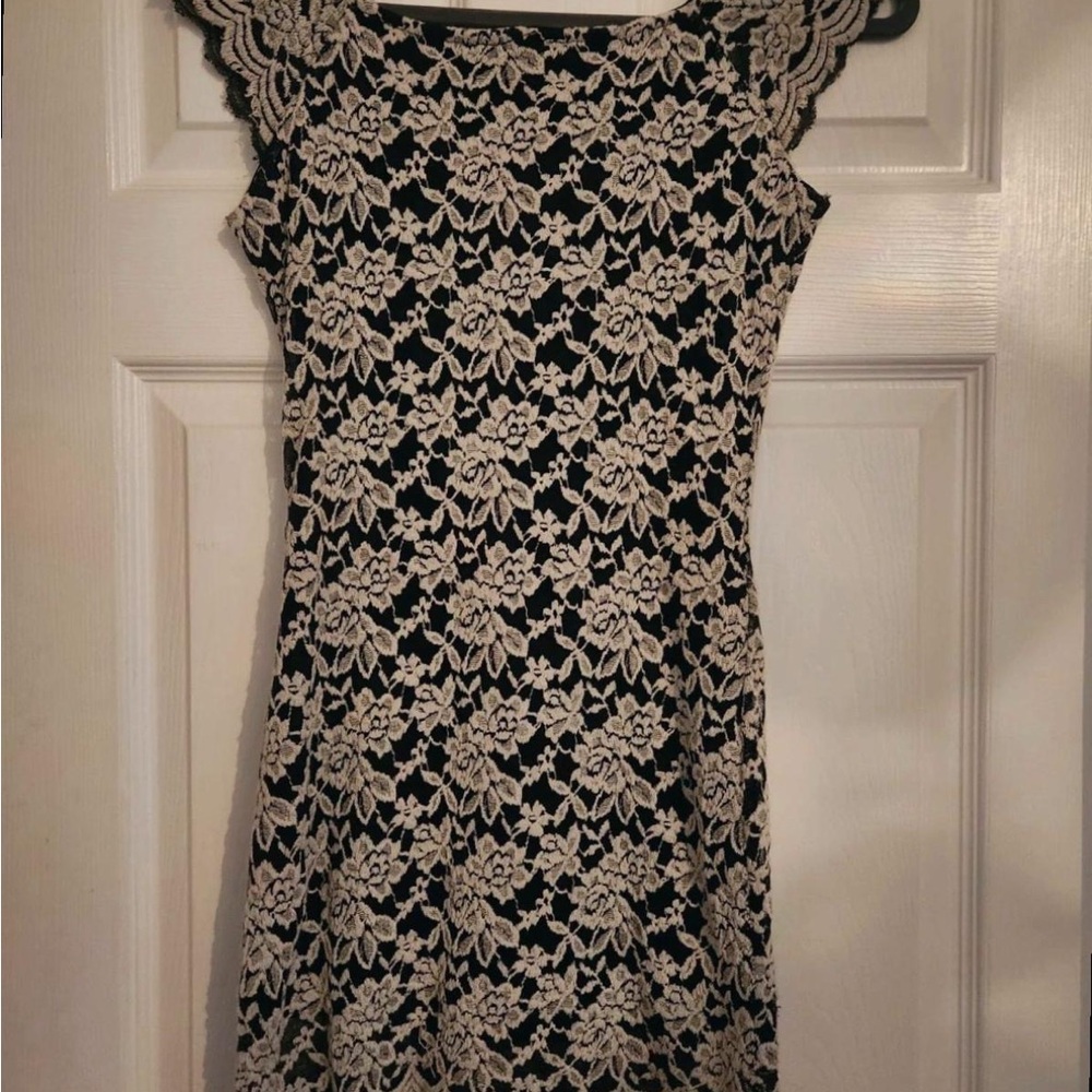 Elegant Lace Overlay Mini Dress in Black and Cream